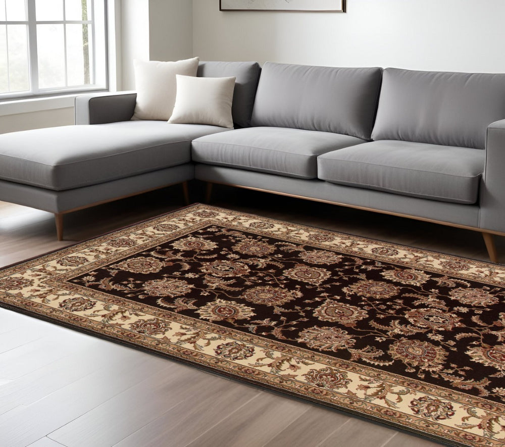 HomeRoots 6' Brown And Ivory Oriental Round Rug - Timeless Geometric Design for Elegant Living Spaces 7' X 10' 574328