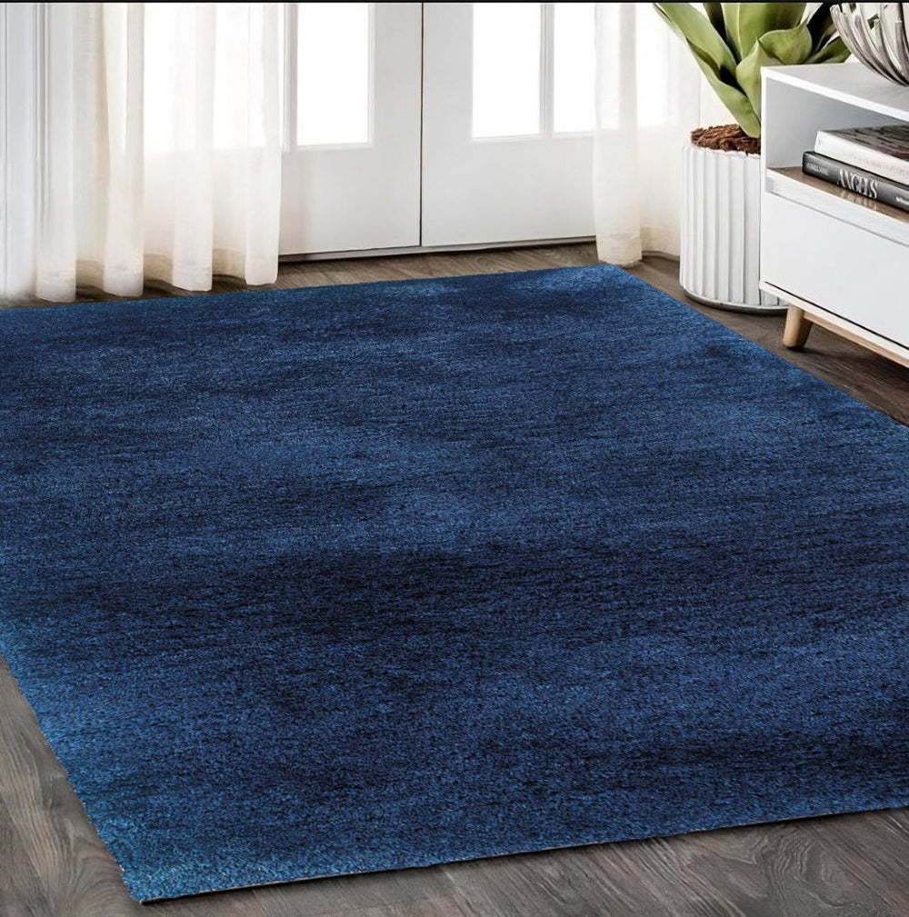 HomeRoots 5' Luxurious Blue Shag Hand-Tufted Area Rug - Soft, Stain-Resistant, Perfect for Modern Living Spaces 5' X 7' 574446