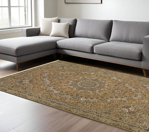 HomeRoots 5' Red and Gold Medallion Area Rug with Fringed Edges - Durable, Stain-Resistant, Timeless Design 7' X 10' 574538