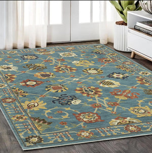HomeRoots 5' Timeless Blue Yellow Ivory Oriental Area Rug - Durable, Elegant Design with Stylish Fringe Finish 5' X 8' 574569