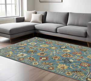 HomeRoots 5' Timeless Blue Yellow Ivory Oriental Area Rug - Durable, Elegant Design with Stylish Fringe Finish 10' X 13' 574570
