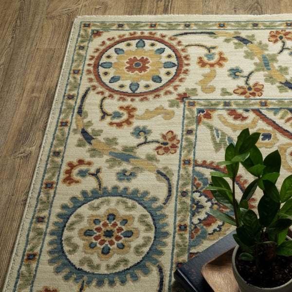 HomeRoots 5' Ivory Blue and Orange Oriental Area Rug with Classic Fringe - Durable, Stain Resistant Design 7' X 10' 574603
