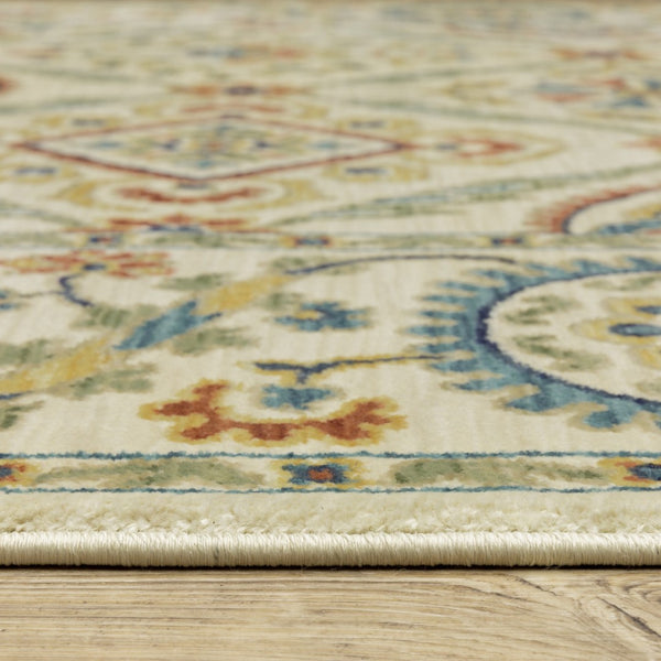 HomeRoots 5' Ivory Blue and Orange Oriental Area Rug with Classic Fringe - Durable, Stain Resistant Design 7' X 10' 574603