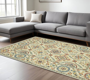 Homeroots 5' Inviting Ivory And Blue Orange Oriental Area Rug With Fringe - Stylish, Durable, And Versatile Decor 8' X 11' Polypropylene 574604