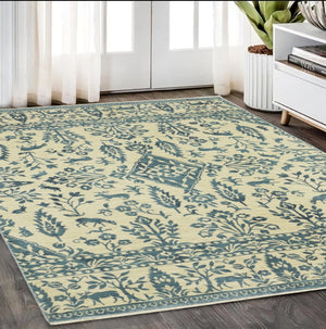 HomeRoots 5' Elegant Ivory and Blue Oriental Area Rug with Fringe - Stain Resistant, Ideal for Any Room 5' X 8' 574605