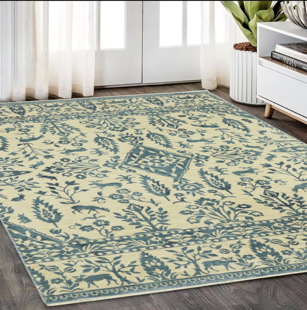 HomeRoots 5' Elegant Ivory and Blue Oriental Area Rug with Fringe - Stain Resistant, Ideal for Any Room 5' X 8' 574605