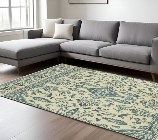 HomeRoots 5' Elegant Ivory and Blue Oriental Area Rug with Fringe - Stain Resistant, Ideal for Any Room 7' X 10' 574607