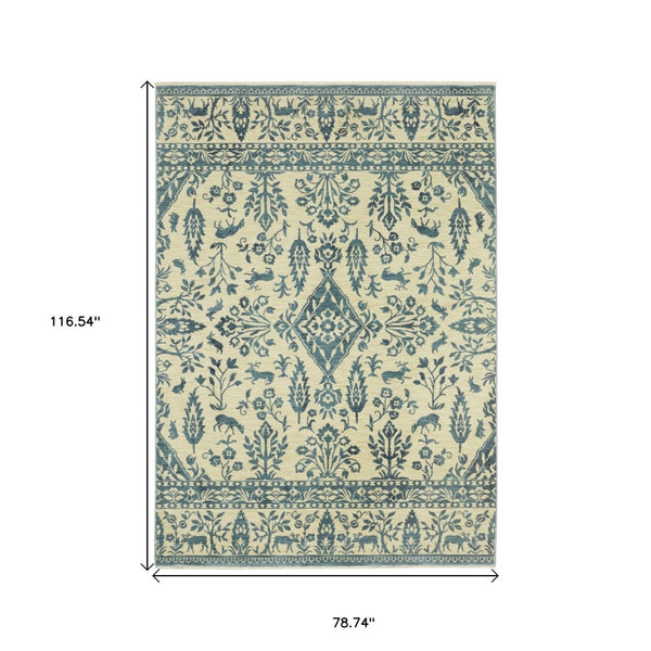 HomeRoots 5' Elegant Ivory and Blue Oriental Area Rug with Fringe - Stain Resistant, Ideal for Any Room 7' X 10' 574607