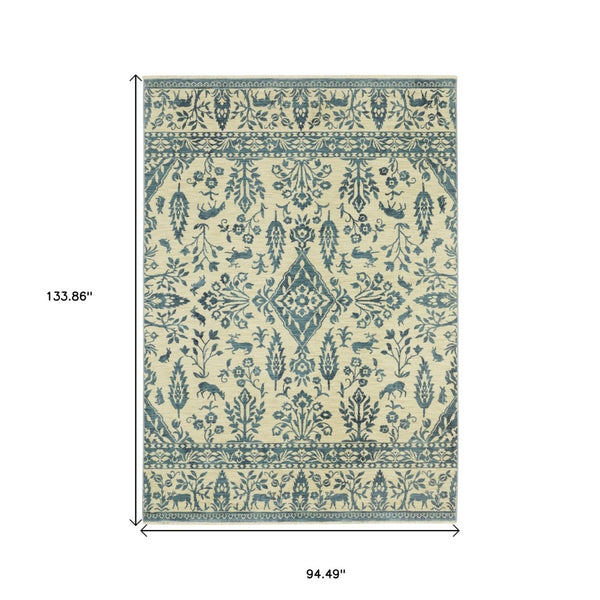 HomeRoots 5' Elegant Ivory and Blue Oriental Area Rug with Fringe - Stain Resistant, Ideal for Any Room 8' X 11' 574608