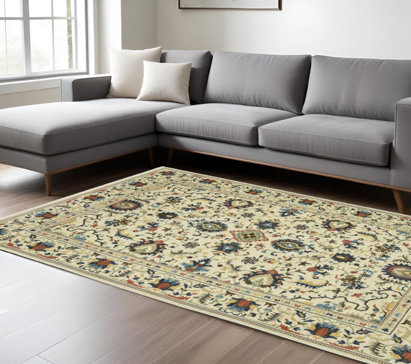 HomeRoots 5' Timeless Ivory Oriental Area Rug with Blue and Orange Accents – Durable, Stain-Resistant Design 7' X 10' 574619
