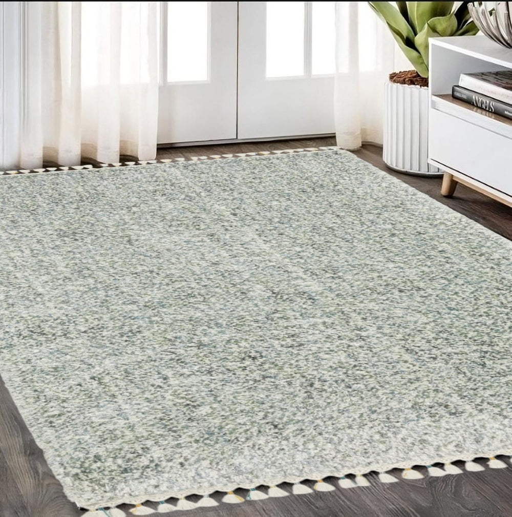HomeRoots 5' Light Blue and Ivory Abstract Shag Area Rug with Fringed Edges for Cozy, Modern Living Spaces 5' X 8' 574625