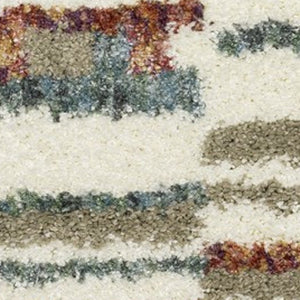 Homeroots 5' Cozy Tan Gray Ivory Abstract Shag Area Rug With Fringe – Stylish, Stain-resistant, Soft Luxury 7' X 10' Polypropylene 574653