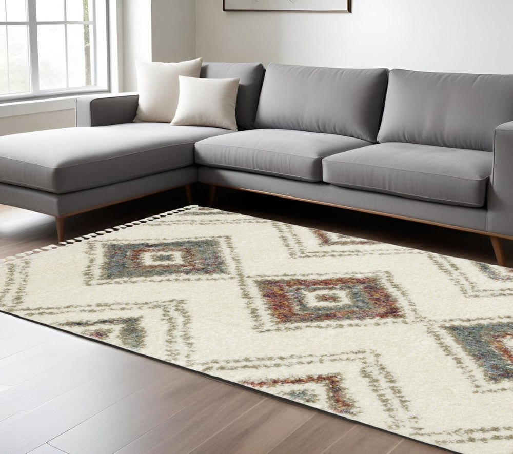 HomeRoots 5' Cozy Southwestern Shag Area Rug in Ivory, Red & Orange with Trendy Fringed Edges for Any Space 10' X 13' 574656
