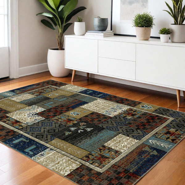 Homeroots 5' Artistic Blue Patchwork Area Rug - Stain Resistant, Perfect For Kids & Pets, Adds Warmth To Home 4' X 6' Polypropylene 574672