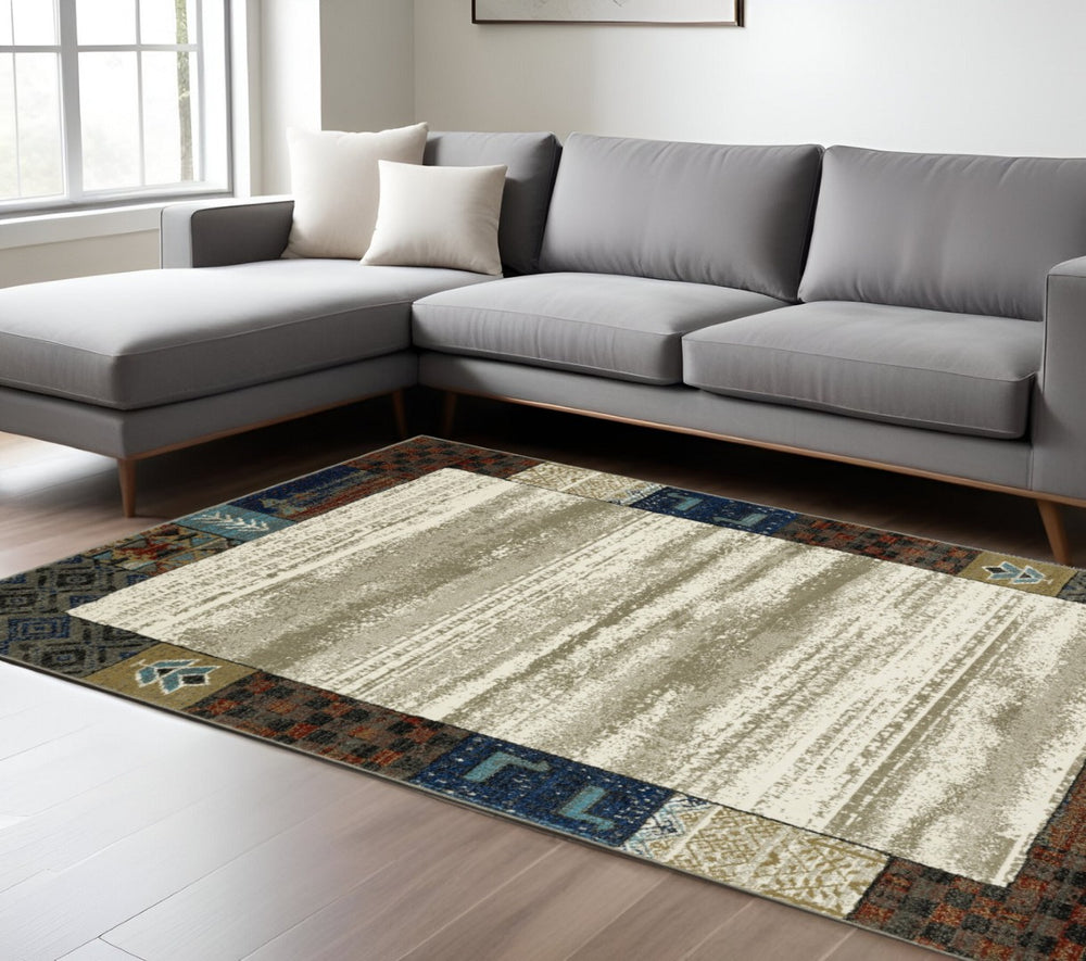 HomeRoots 5' Elegant Ivory Tan and Blue Patchwork Area Rug – Durable, Stain-Resistant, Perfect for Any Room! 10' X 13' 574676