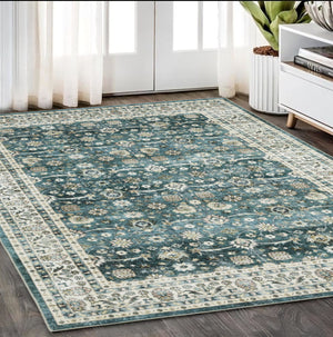 Homeroots 4' Teal Oriental Distressed Area Rug - Stylish, Non-skid, Stain-resistant Design For Any Room 5' X 7' Polyester 574716