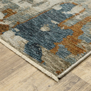 HomeRoots 10' Abstract Distressed Area Rug in Beige with Rust and Teal Hues, Fringe Edges for Timeless Charm 10' X 13' 574754