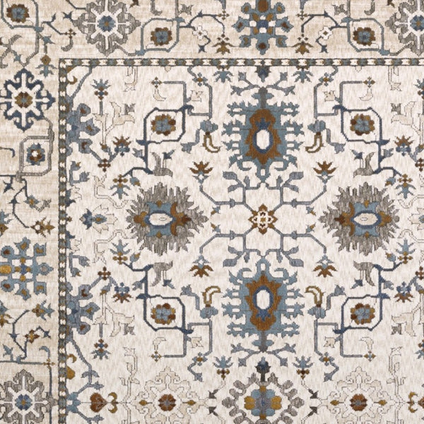 HomeRoots 5' Elegant Ivory Oriental Area Rug with Burnt Orange and Blue Accents - Stain & Fade Resistant 4' X 6' 574816