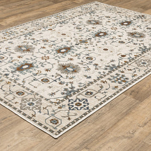 HomeRoots 5' Elegant Ivory Oriental Area Rug with Burnt Orange and Blue Accents - Stain & Fade Resistant 7' X 10' 574817