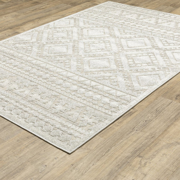 HomeRoots 5' Beige and Ivory Tribal Area Rug - Durable, Stain-Resistant Design for Stylish Living Spaces 7' X 10' 574821