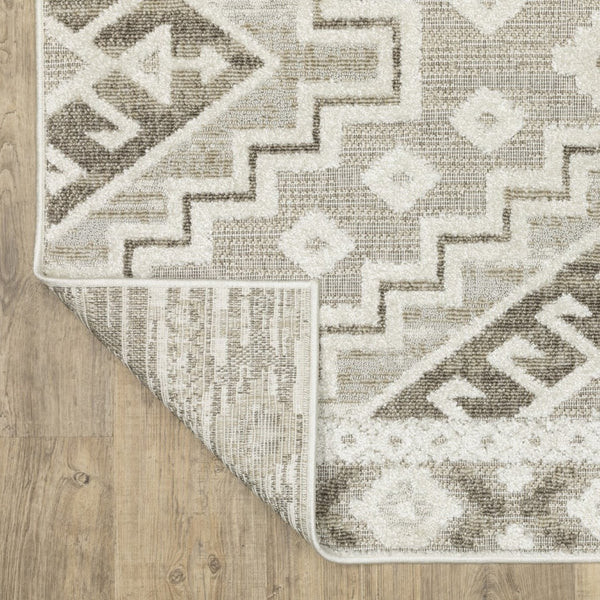 HomeRoots 5' Chic Beige and Brown Tribal Area Rug - Durable, Stain-Resistant Design for Any Stylish Space 5' X 8' 574827
