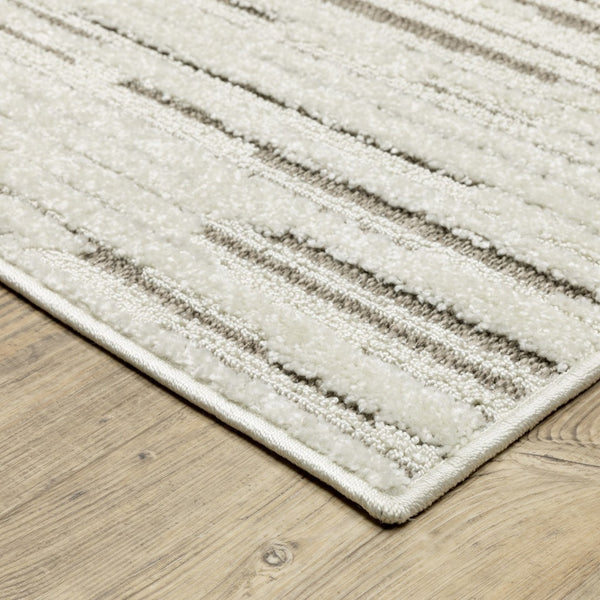 HomeRoots 5' Distressed Ivory and Brown Striped Area Rug - Durable, Stain-Resistant, Perfect for Any Space 7' X 10' 574837