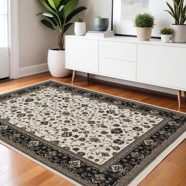 Homeroots 5' Ivory Oriental Area Rug With Fringe - Elegant Design, Stain Resistant, Perfect For Any Space 4' X 6' Polyester 574853