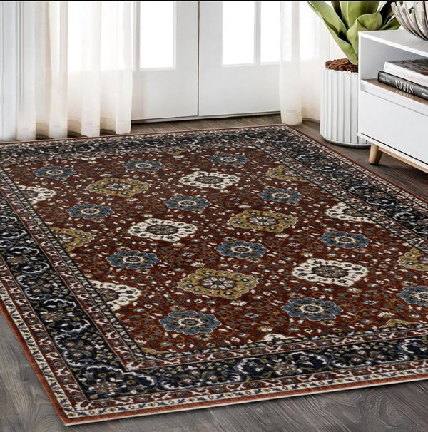HomeRoots 5' Red Medallion Area Rug with Fringe - Elegant, Stain-Resistant Design for Stylish Living Spaces! 5' X 8' 574861