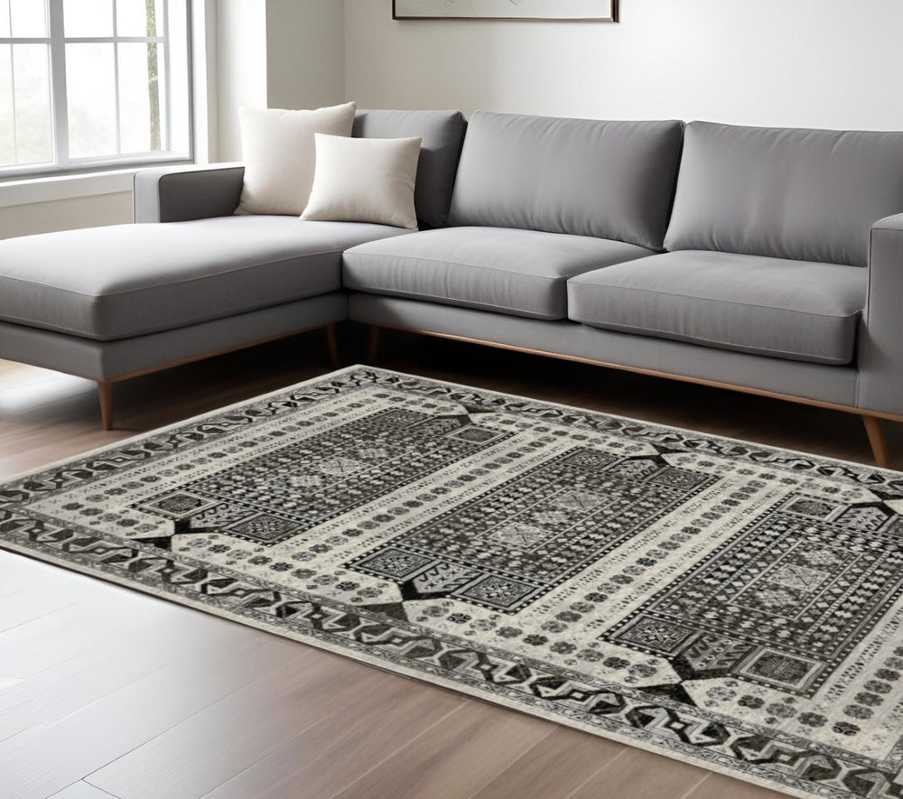 HomeRoots 5' Elegant Ivory and Charcoal Oriental Area Rug with Fringe - Durable, Stain-Resistant, Timeless Style 10' X 13' 574882