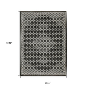HomeRoots 5' Modern Black and Gray Diamond Area Rug with Stylish Fringe for Durable, Cozy Living Spaces 5' X 8' 574885