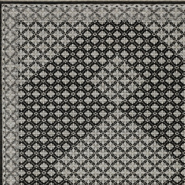 HomeRoots 5' Modern Black and Gray Diamond Area Rug with Stylish Fringe for Durable, Cozy Living Spaces 7' X 10' 574887