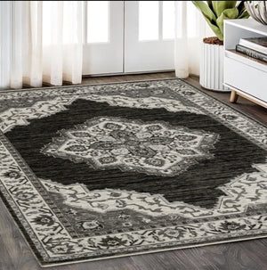 Homeroots 10' Charcoal Medallion Area Rug With Fringe – Stylish, Stain-resistant Design For Warm Interiors 5' X 8' Polyester 574890