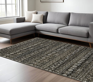 Homeroots 5' Black Tribal Area Rug With Fringe – Modern Design, Stain Resistant, Perfect For Homes With Kids & Pets 8' X 11' Polyester 574900