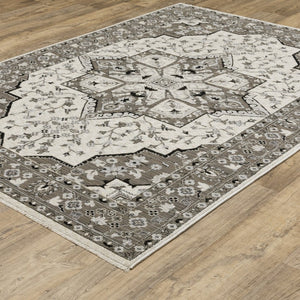 HomeRoots 5' Ivory and Gray Medallion Area Rug with Fringe – Timeless Style, Stain-Resistant, Perfect for Any Space 5' X 8' 574901
