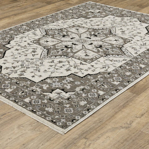 HomeRoots 5' Ivory and Gray Medallion Area Rug with Fringe – Timeless Style, Stain-Resistant, Perfect for Any Space 7' X 10' 574903