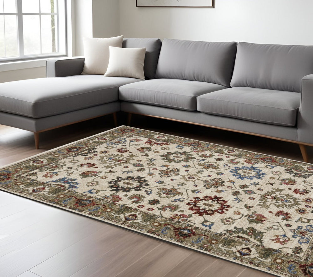 HomeRoots 5' Elegant Ivory and Green Oriental Area Rug with Fringe for Luxurious Living Spaces & Durability 7' X 10' 574913