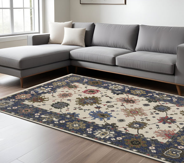 Homeroots 5' Elegant Ivory Blue Gray Floral Area Rug With Fringe - Stain Resistant, Soft Texture For Any Space 10' X 13' Polyester 574916