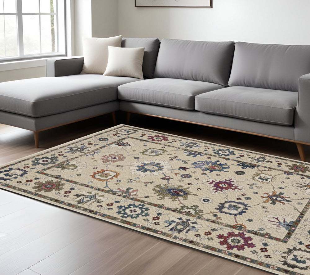 Homeroots 5' Elegant Ivory Blue Gray Floral Area Rug With Fringe - Stain Resistant, Soft Texture For Any Space 7' X 10' Polyester 574923
