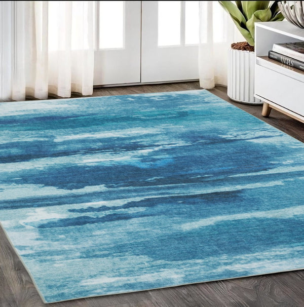 HomeRoots 5' Sky Blue and Ivory Abstract Distressed Area Rug – Modern Low-Pile Design for Stylish Spaces 5' X 7' 574978