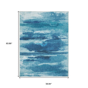 HomeRoots 5' Sky Blue and Ivory Abstract Distressed Area Rug – Modern Low-Pile Design for Stylish Spaces 5' X 7' 574978