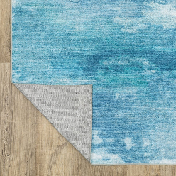 HomeRoots 5' Sky Blue and Ivory Abstract Distressed Area Rug – Modern Low-Pile Design for Stylish Spaces 5' X 7' 574978