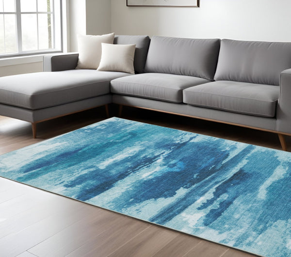 HomeRoots 5' Sky Blue and Ivory Abstract Distressed Area Rug – Modern Low-Pile Design for Stylish Spaces 8' X 10' 574980