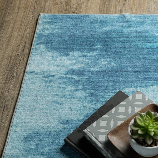 HomeRoots 5' Sky Blue and Ivory Abstract Distressed Area Rug – Modern Low-Pile Design for Stylish Spaces 8' X 10' 574980