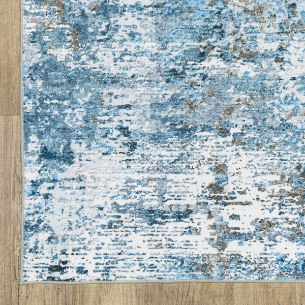 Homeroots 5' Abstract Blue Distressed Area Rug - Stylish Non-skid Design, Stain Resistant & Perfect For Homes 5' X 7' Polyester 574990