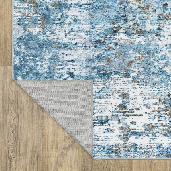 Homeroots 5' Abstract Blue Distressed Area Rug - Stylish Non-skid Design, Stain Resistant & Perfect For Homes 5' X 7' Polyester 574990
