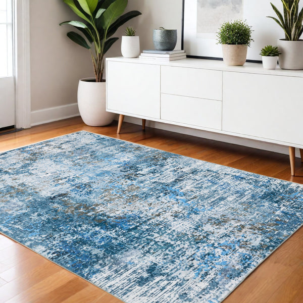 Homeroots 5' Abstract Blue Distressed Area Rug - Stylish Non-skid Design, Stain Resistant & Perfect For Homes 4' X 6' Polyester 574991