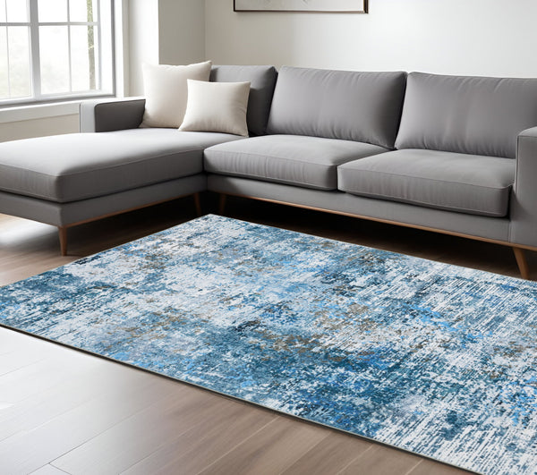 Homeroots 5' Abstract Blue Distressed Area Rug - Stylish Non-skid Design, Stain Resistant & Perfect For Homes 8' X 10' Polyester 574992