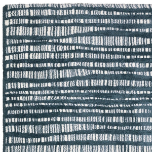 HomeRoots 5' Teal and Ivory Striped Distressed Area Rug - Luxuriously Soft, Stain-Resistant, Versatile Design 7' X 10' 575036