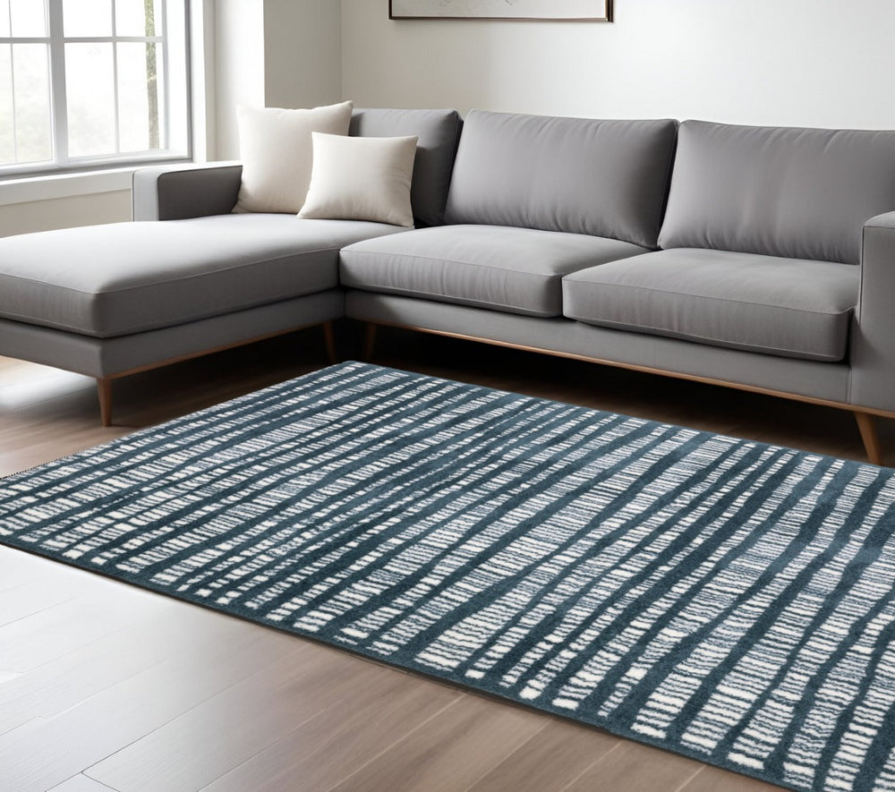 HomeRoots 5' Teal and Ivory Striped Distressed Area Rug - Luxuriously Soft, Stain-Resistant, Versatile Design 7' X 10' 575036
