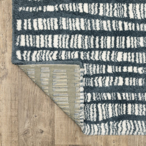 HomeRoots 5' Teal and Ivory Striped Distressed Area Rug - Luxuriously Soft, Stain-Resistant, Versatile Design 8' X 11' 575037